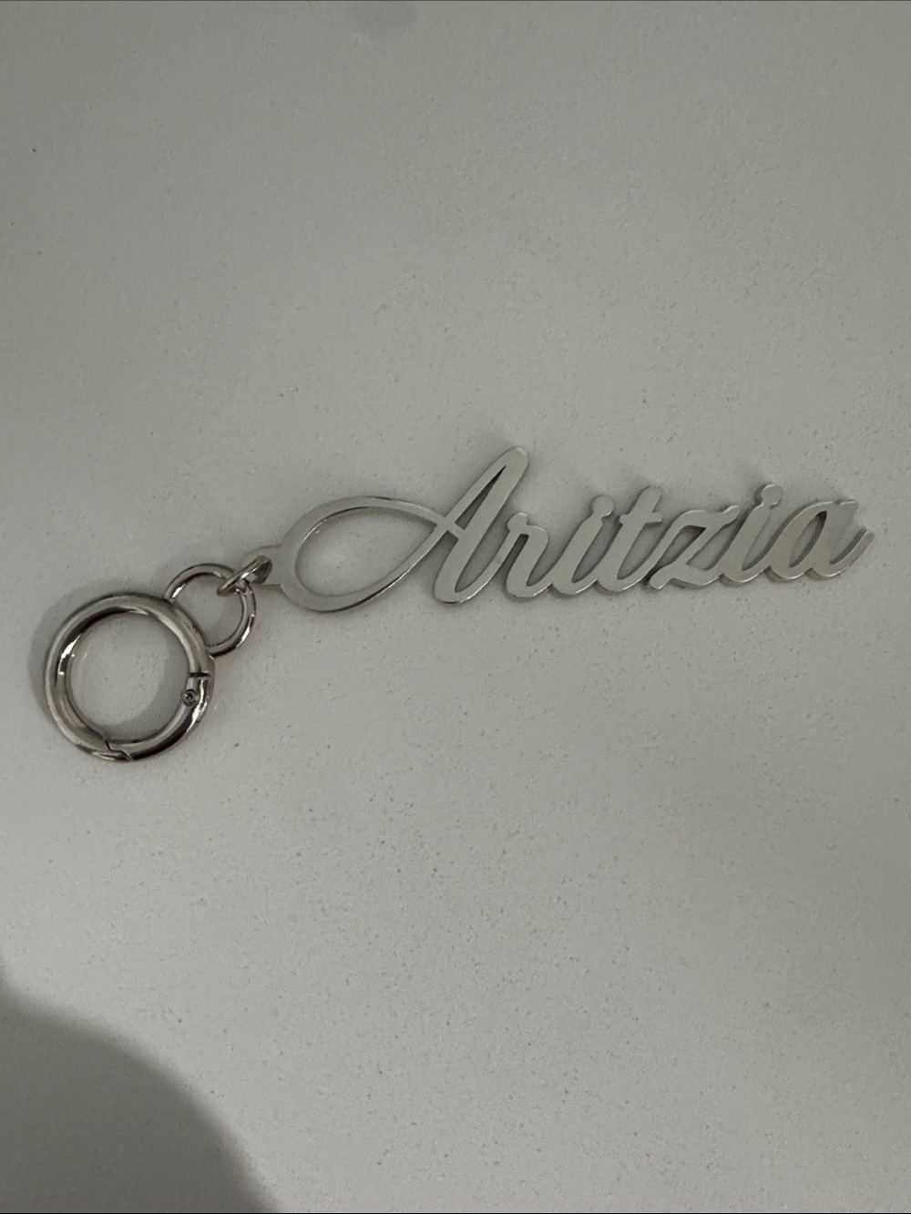 Aritzia Silver Script Logo Keychain